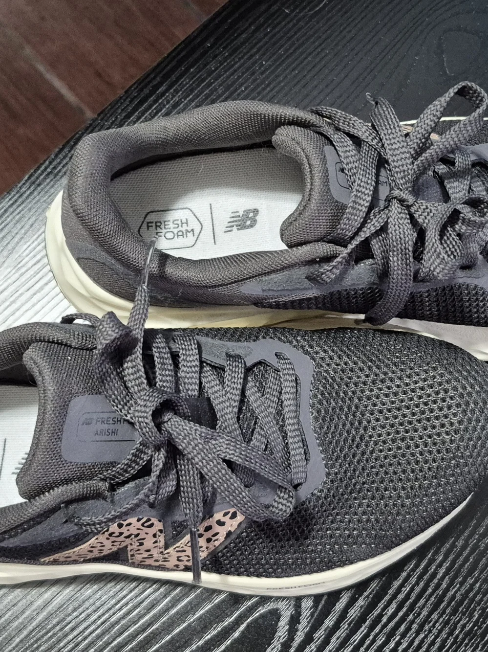 New Balance Women's Black Running Sneakers with Leopard Accent